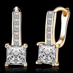 18 karat yellow gold with princess cut Diamonds earing set.